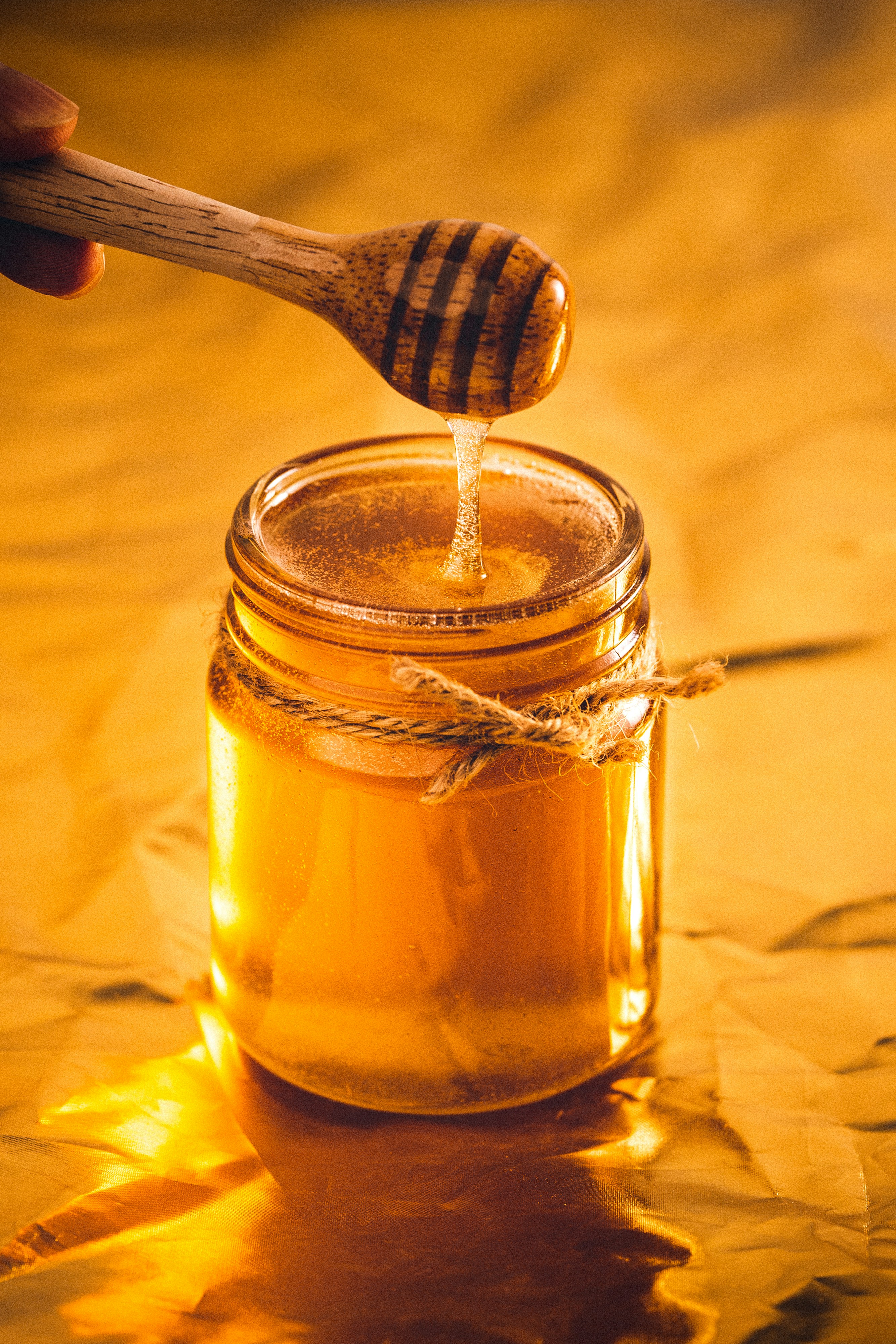 Jar of natural Mercy Gold honey